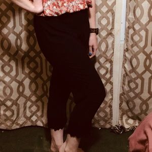 Elle capri dress pants with floral detail on legs.